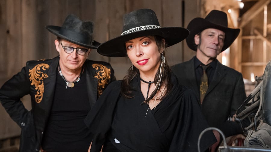 Three in black western wear at Eaves Movie Ranch