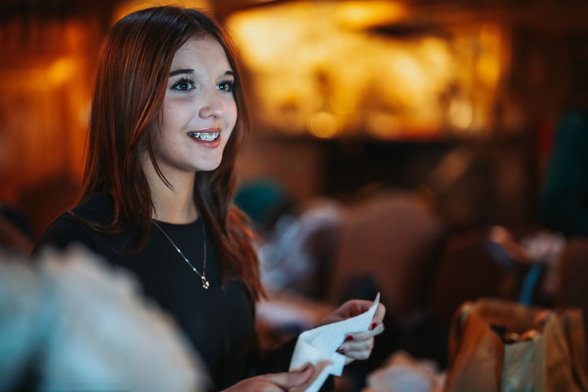 Candid wedding moment during ceremony — Casey Addason Photography