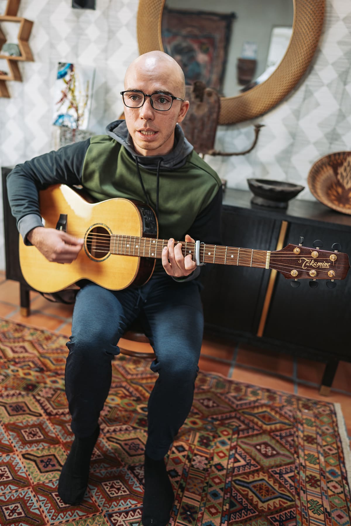 Portrait in Southwestern interior with guitar Santa Fe — Casey Addason Photography