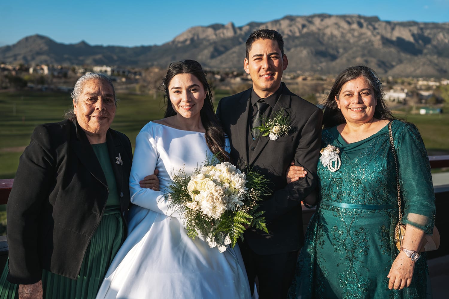 Wedding portrait with New Mexico desert mountain backdrop, elopement photography