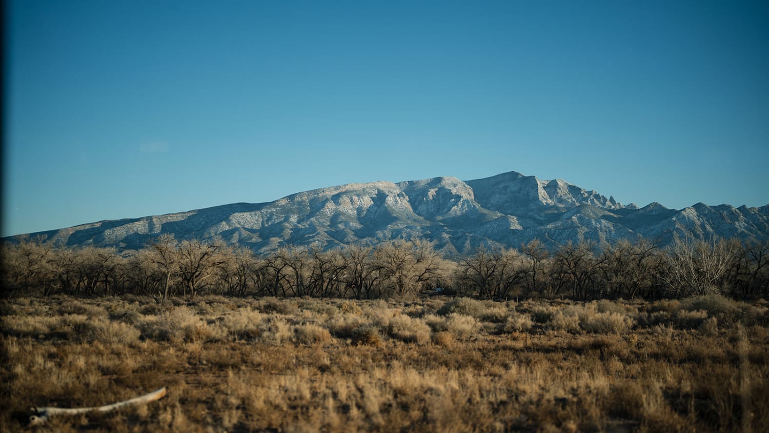 is not a wedding, event, or portrait photograph—it's a landscape image featuring a expansive high... — Casey Addason Photography