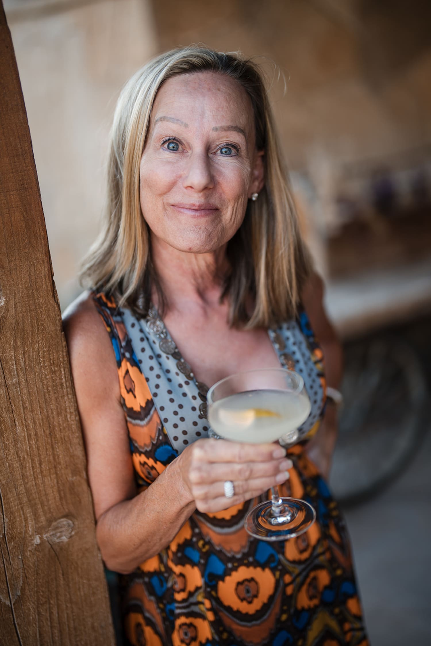 portrait photograph taken in what appears to be an indoor venue with rustic adobe or clay-colored... — Casey Addason Photography