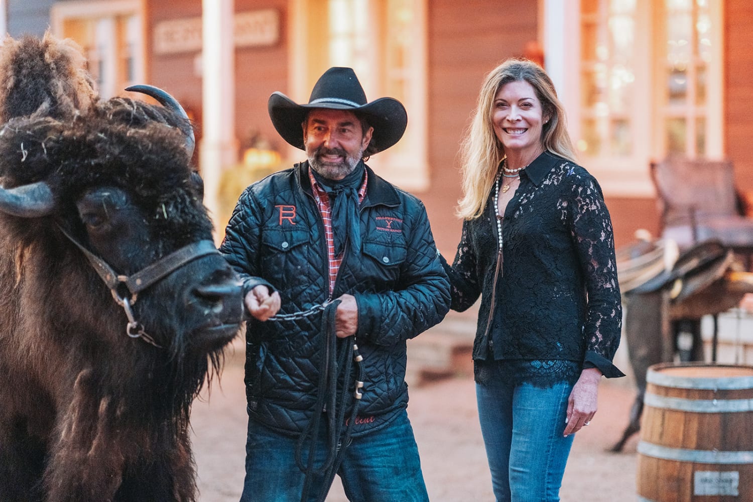 portrait session takes place at a rustic ranch venue with distinctive terracotta/red brick archit... — Casey Addason Photography