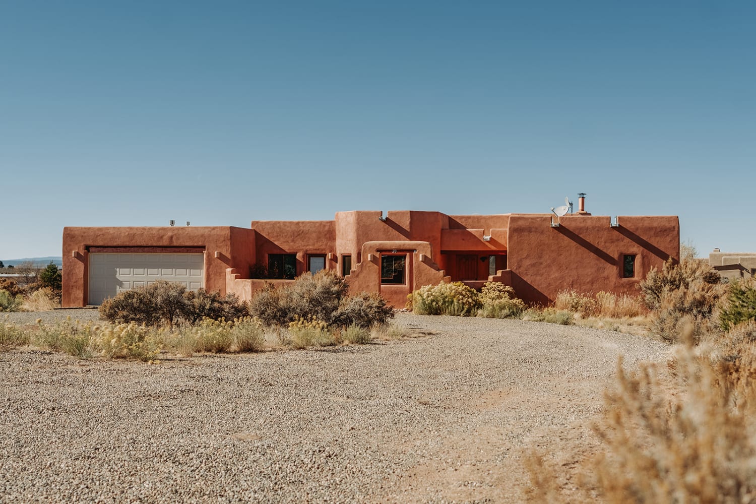 High desert terrain near Taos with arroyo and sparse vegetation — Casey Addason Photography