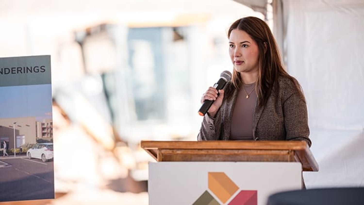 Speaker at golden hour, Dominium groundbreaking ceremony, Santa Fe NM — Casey Addason