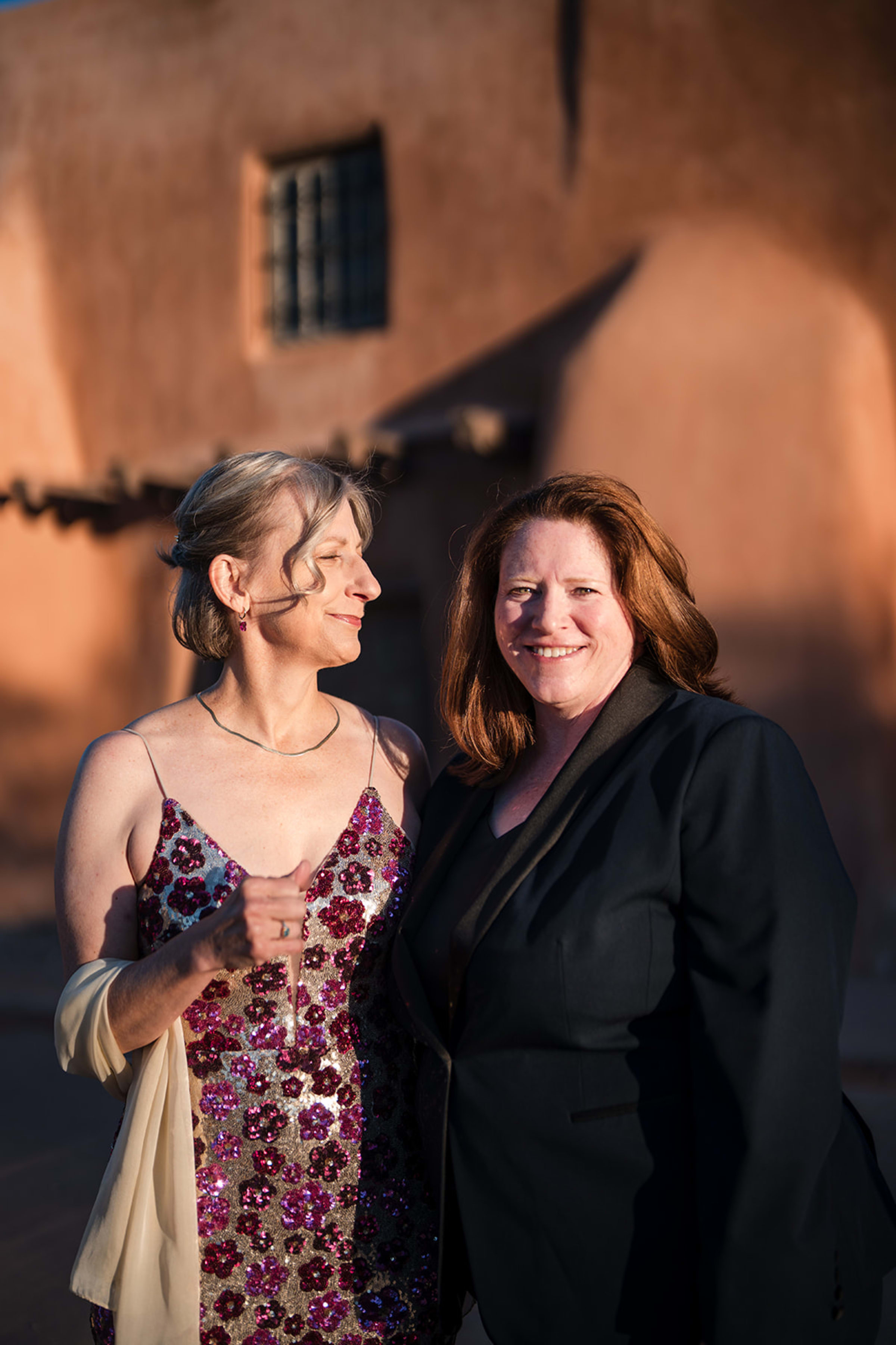 Candid moment between guests at a New Mexico wedding — Casey Addason Photography