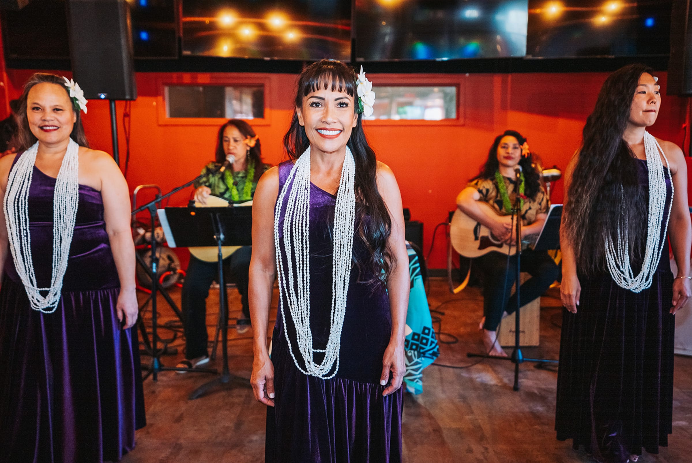 Low-light documentary frame — available light, high ISO, natural grain