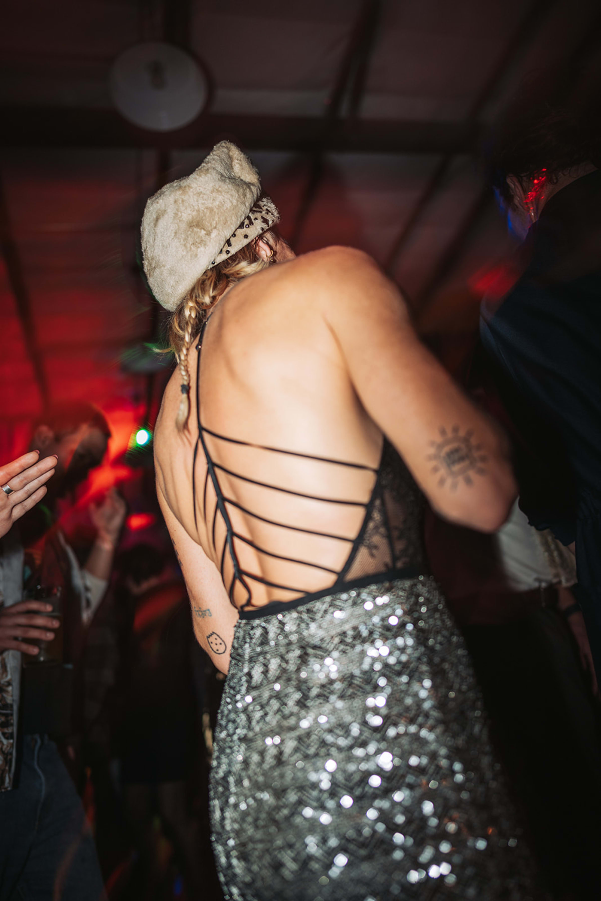 Candlelit atmosphere and warm ambient light inside the New Year's Eve celebration