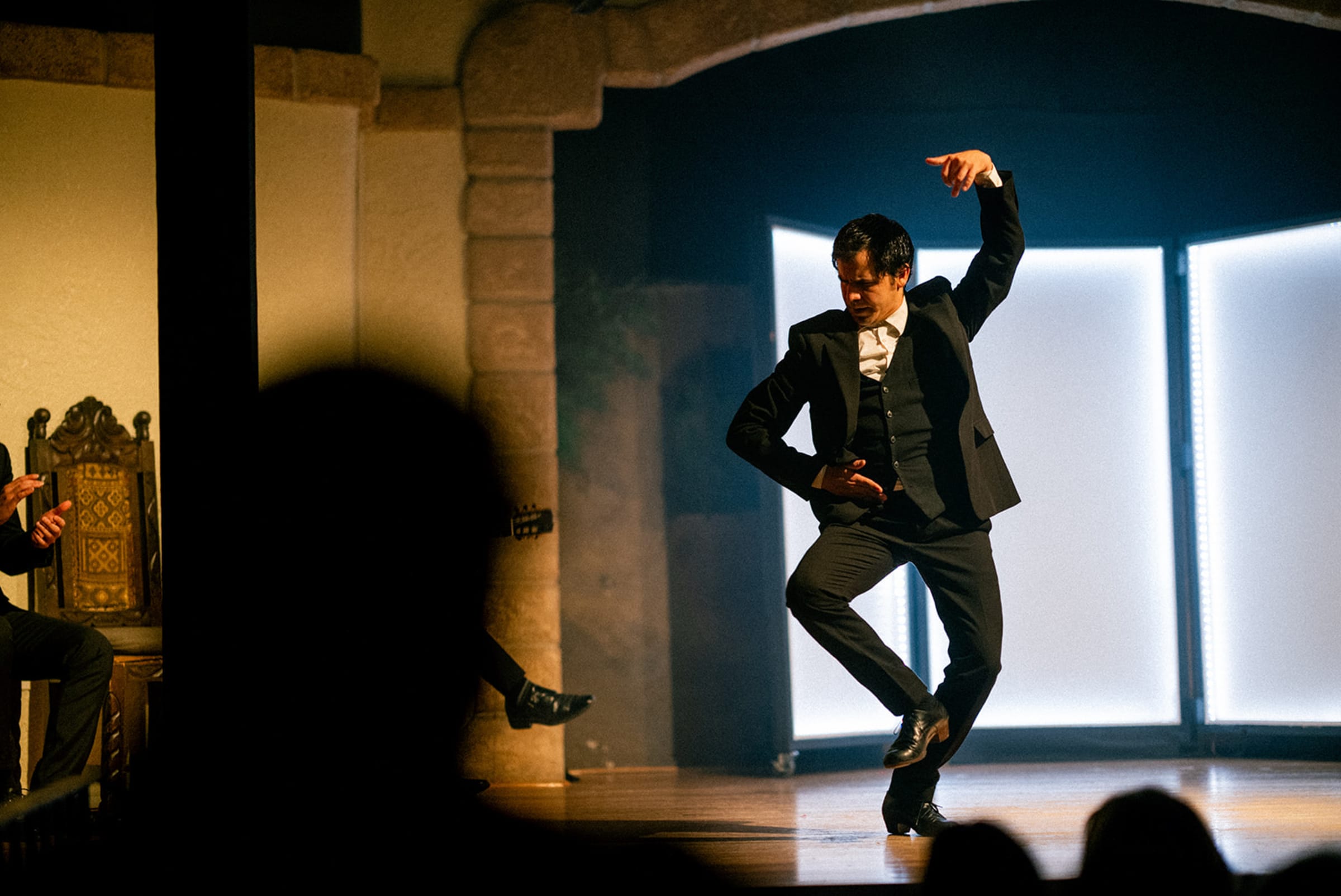 Table detail — glassware and candlelight at a Santa Fe dining event