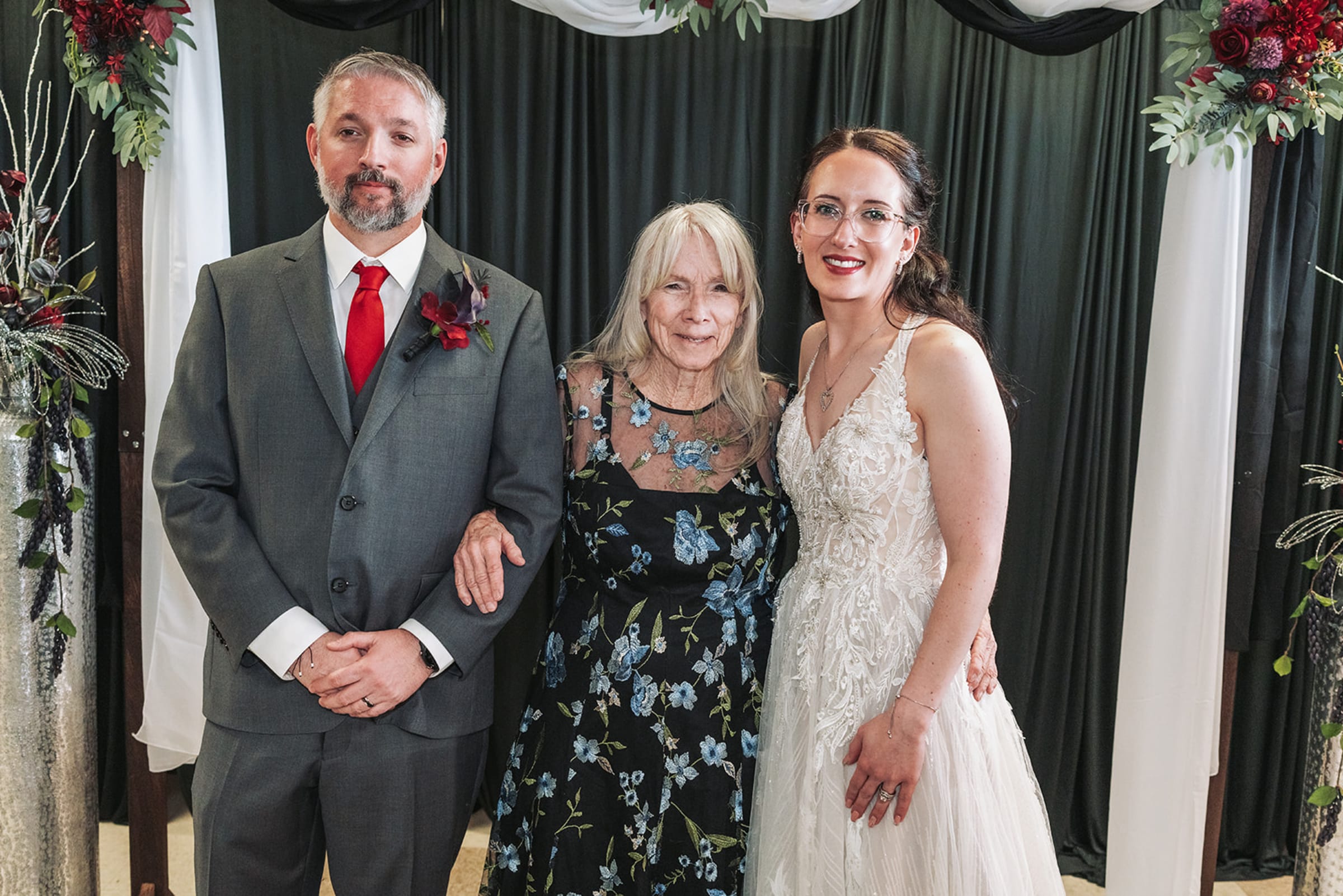 Small wedding ceremony in a Santa Fe adobe courtyard with close friends and family gathered — Casey Addason Photography