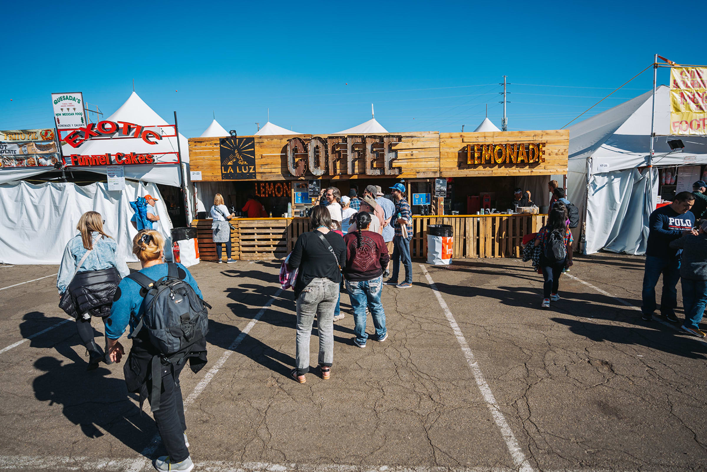 Couple walking through aspen grove during a fall engagement session in Santa Fe National Forest — Casey Addason Photography