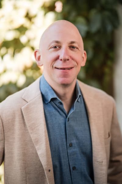 Headshot in natural light, tan blazer — Casey Addason Photography