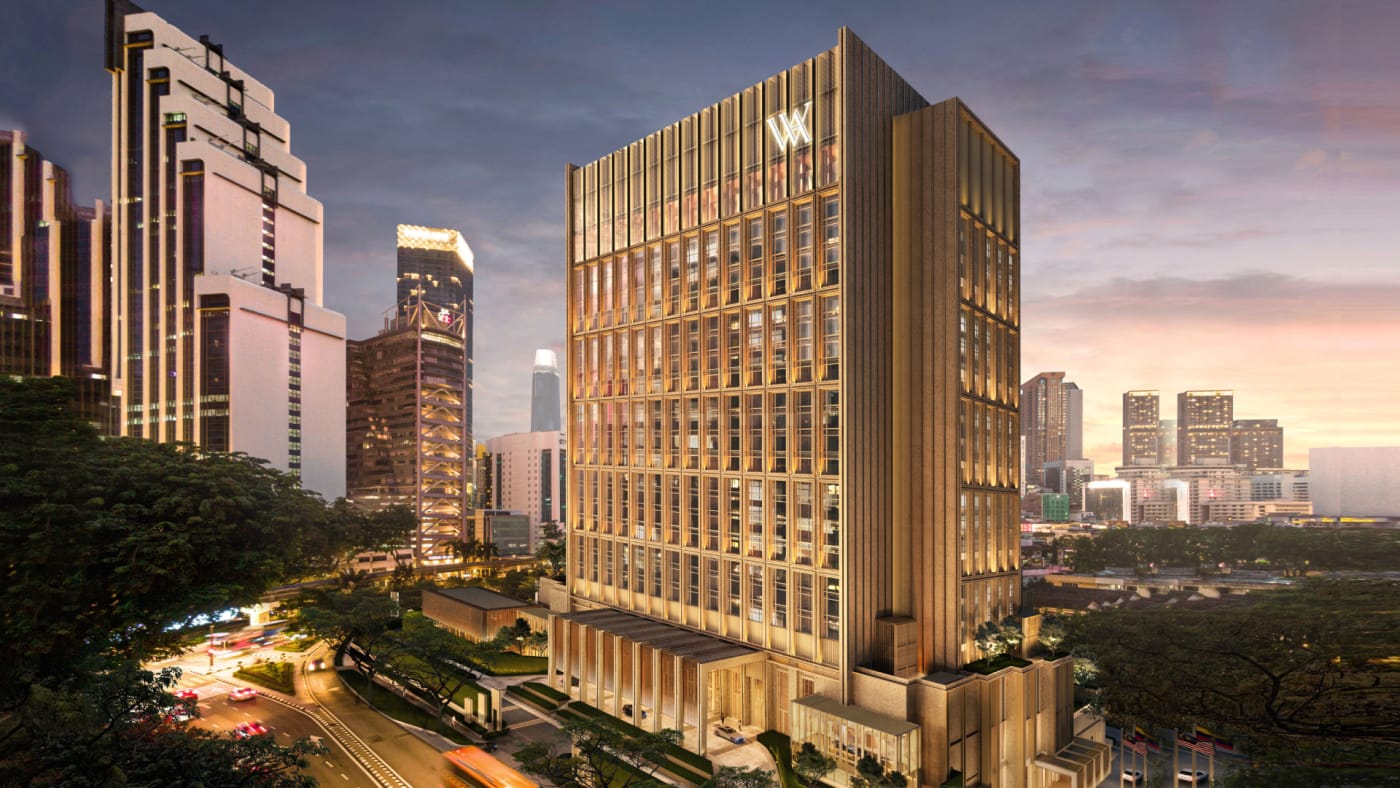 La torre del Waldorf Astoria Kuala Lumpur, 73 Jalan Raja Chulan, en el Triángulo de Oro al atardecer