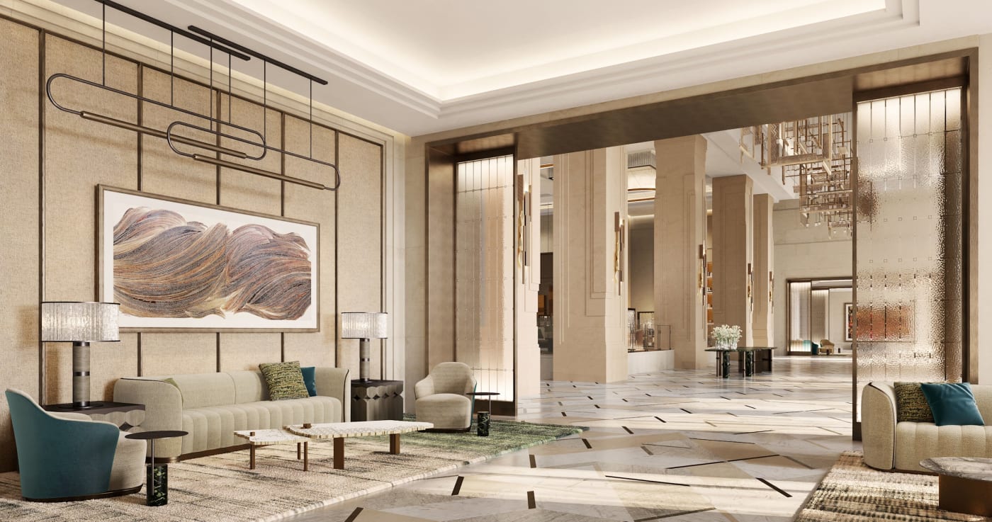 El vestíbulo del Waldorf Astoria Kuala Lumpur, mármol, columnas y lámparas de araña