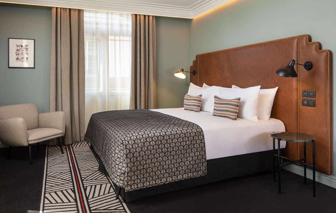 A Privilege room at the Maison Rouge Strasbourg, leather headboard