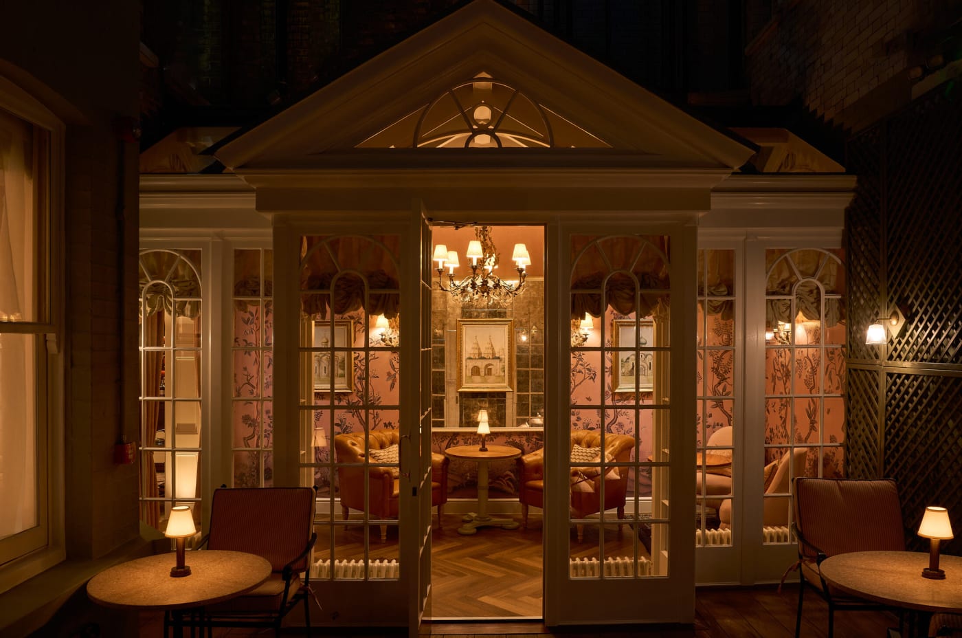 The veranda of the Delany Drawing Room lit up at nightfall