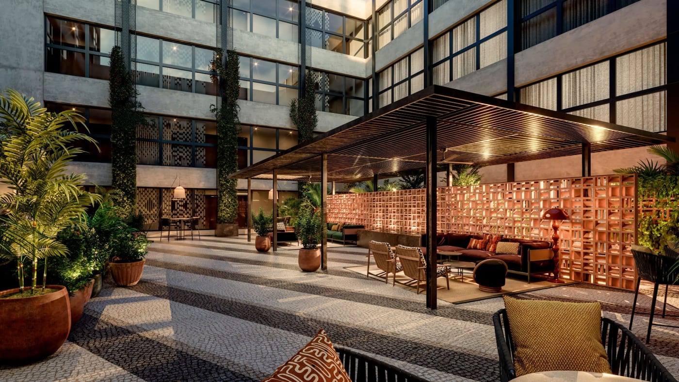 Rendering of the inner courtyard at Thompson Sevilla, palm trees and pergola