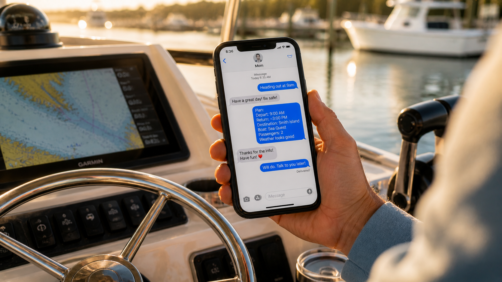 Boater holding a smartphone at the helm sending a float plan text message before departure