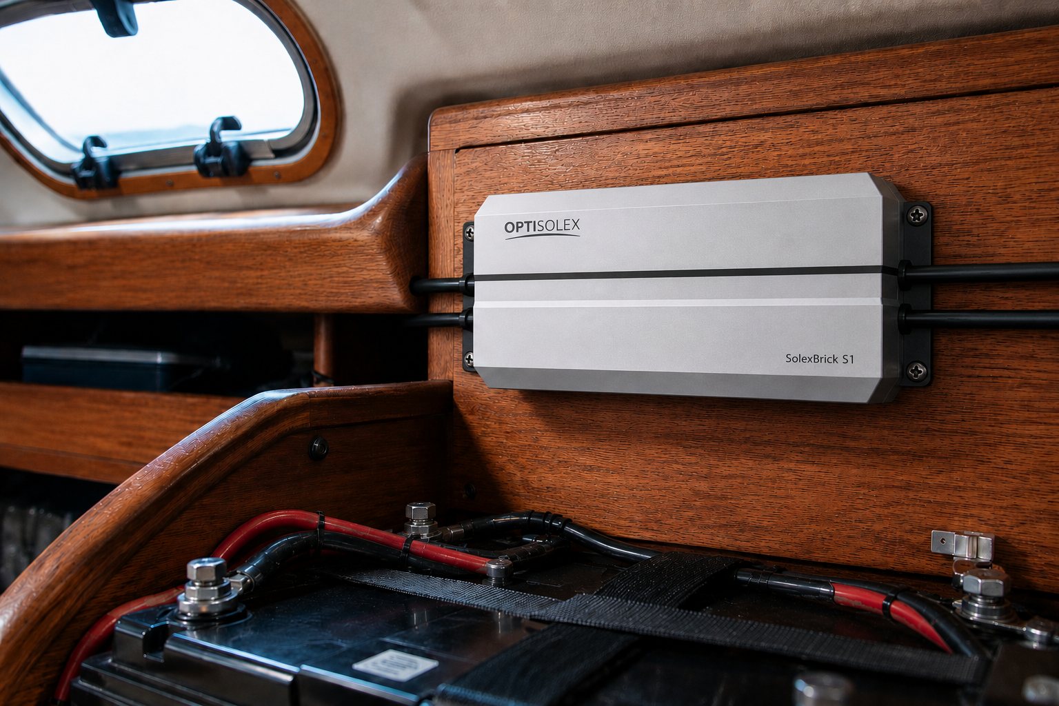 The OptiSolex SolexBrick S1 charge controller wired to the marine battery bank