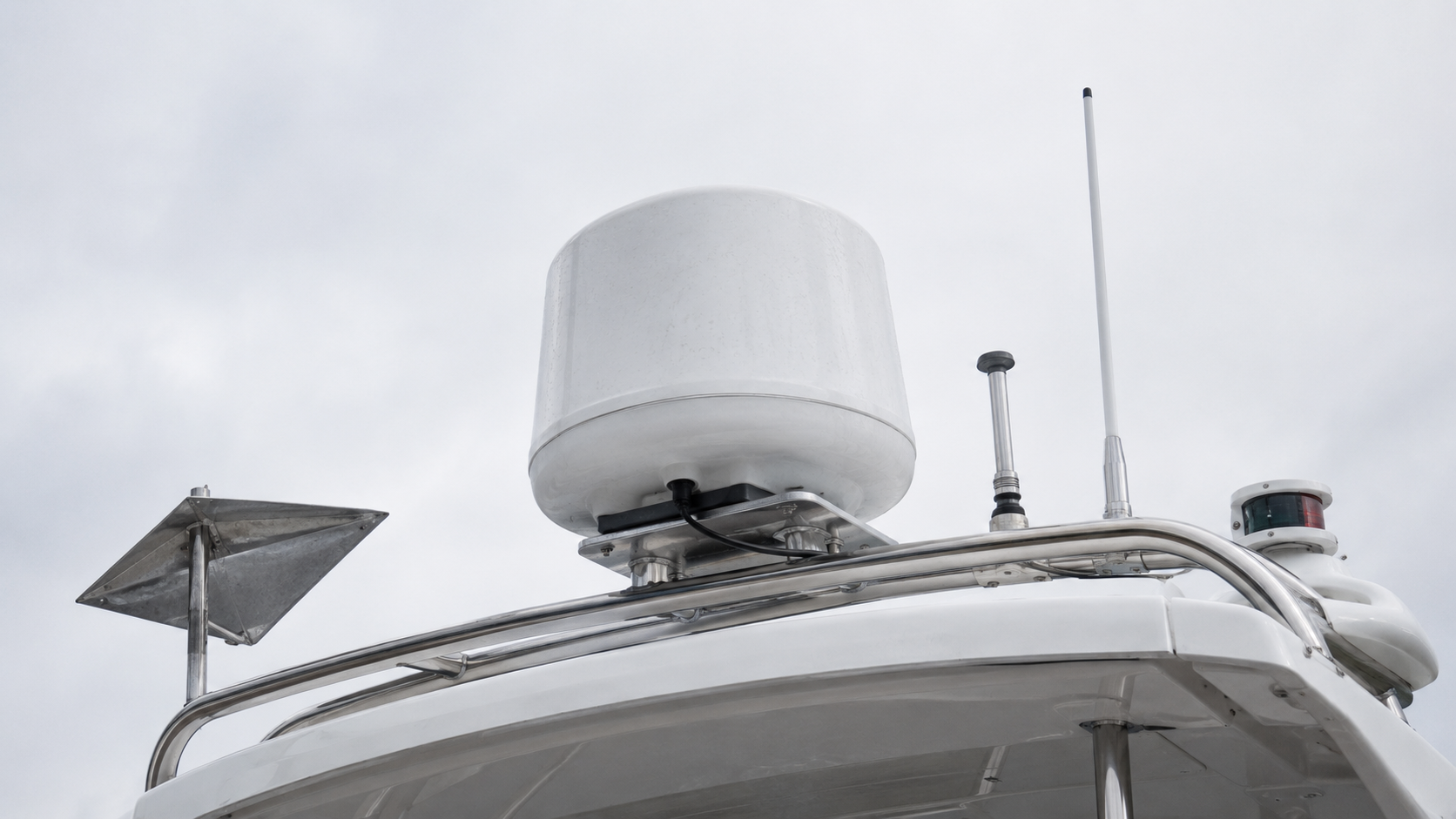 Solid-state radar dome mounted on a stainless arch above a boat hardtop