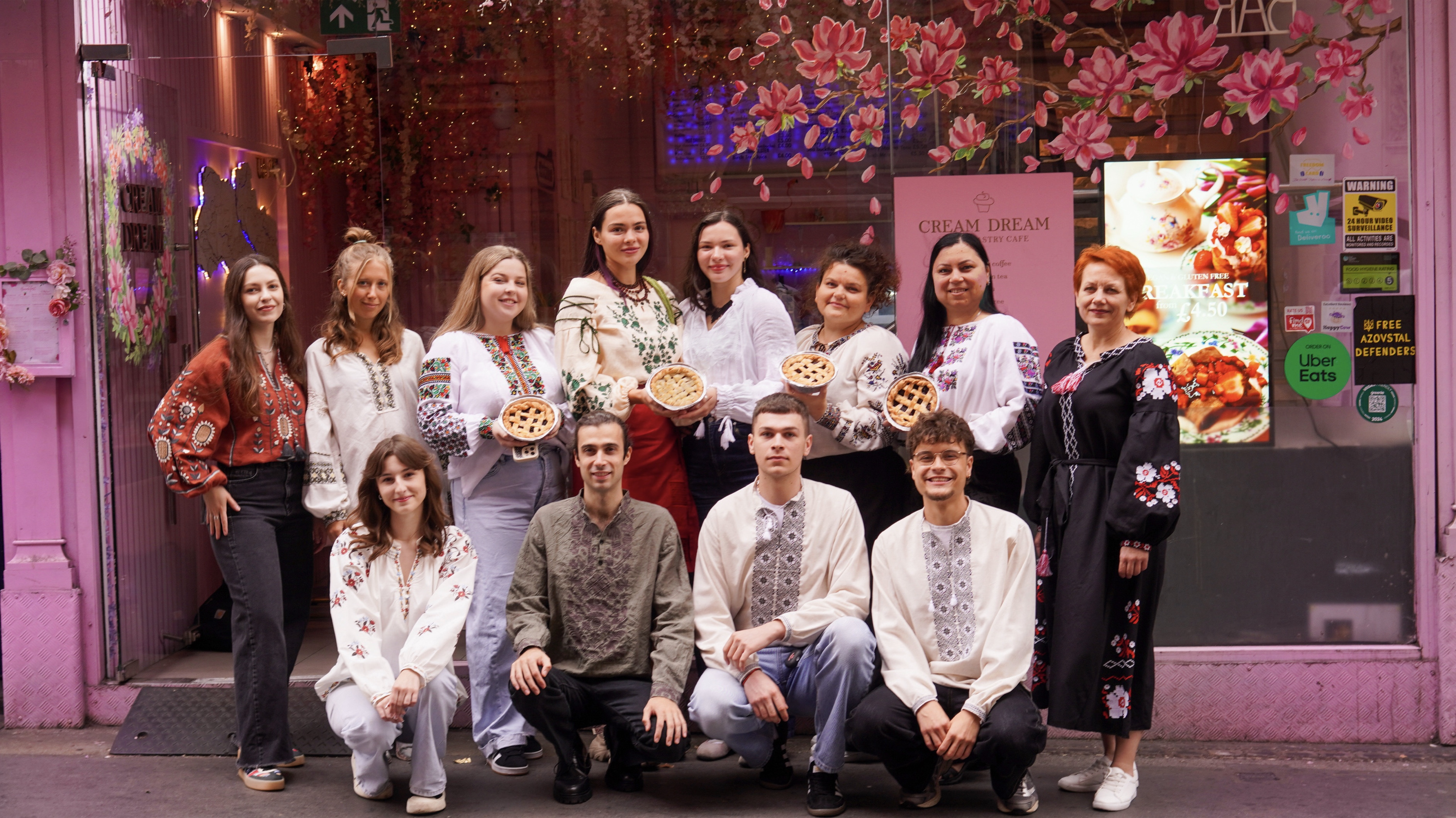 The Cream Dream Café team in their beautiful café space, showcasing the warm and welcoming atmosphere