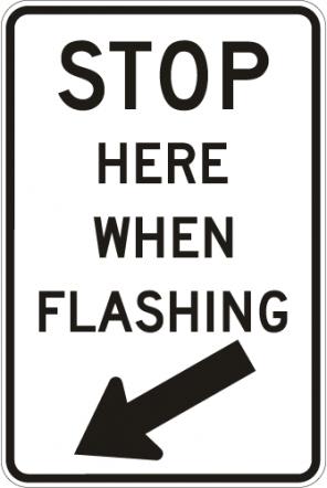 Stop Here When Flashing Sign - R8-10