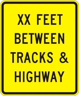 Between Highway And Tracks Sign - W10-11a