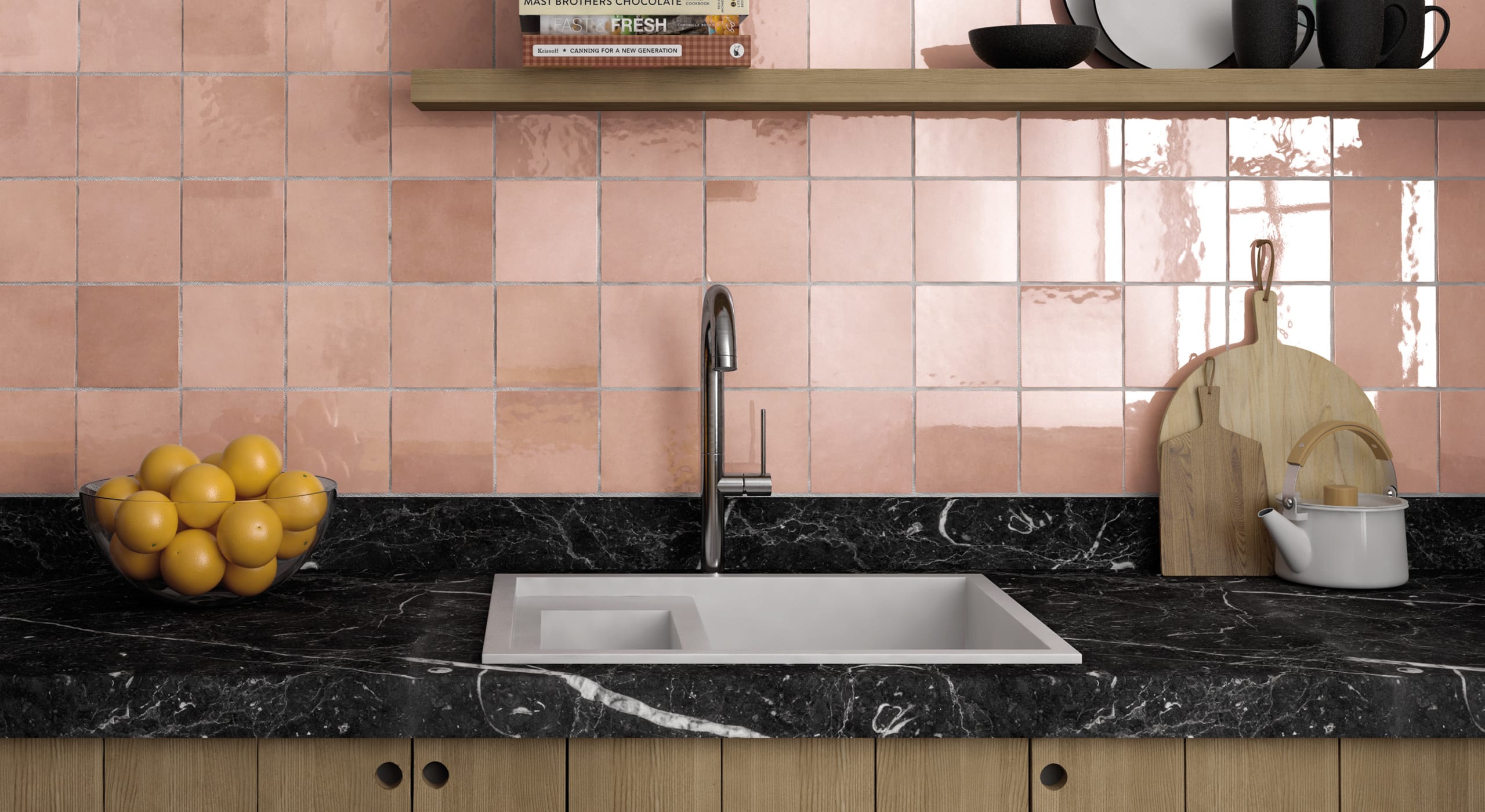 Kitchen with pink square backsplash tile and black marble countertops and a silver faucet