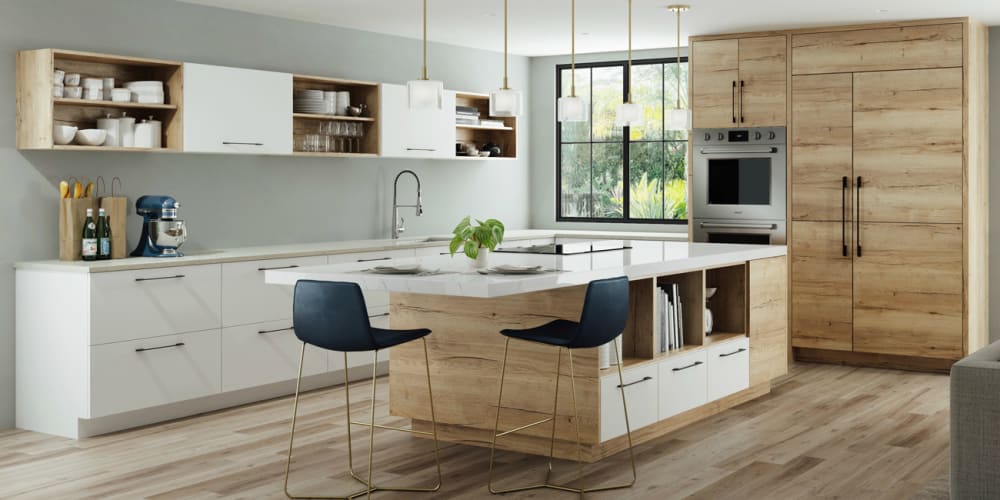 Modern kitchen in bright birch colors with white cabinets and countertops