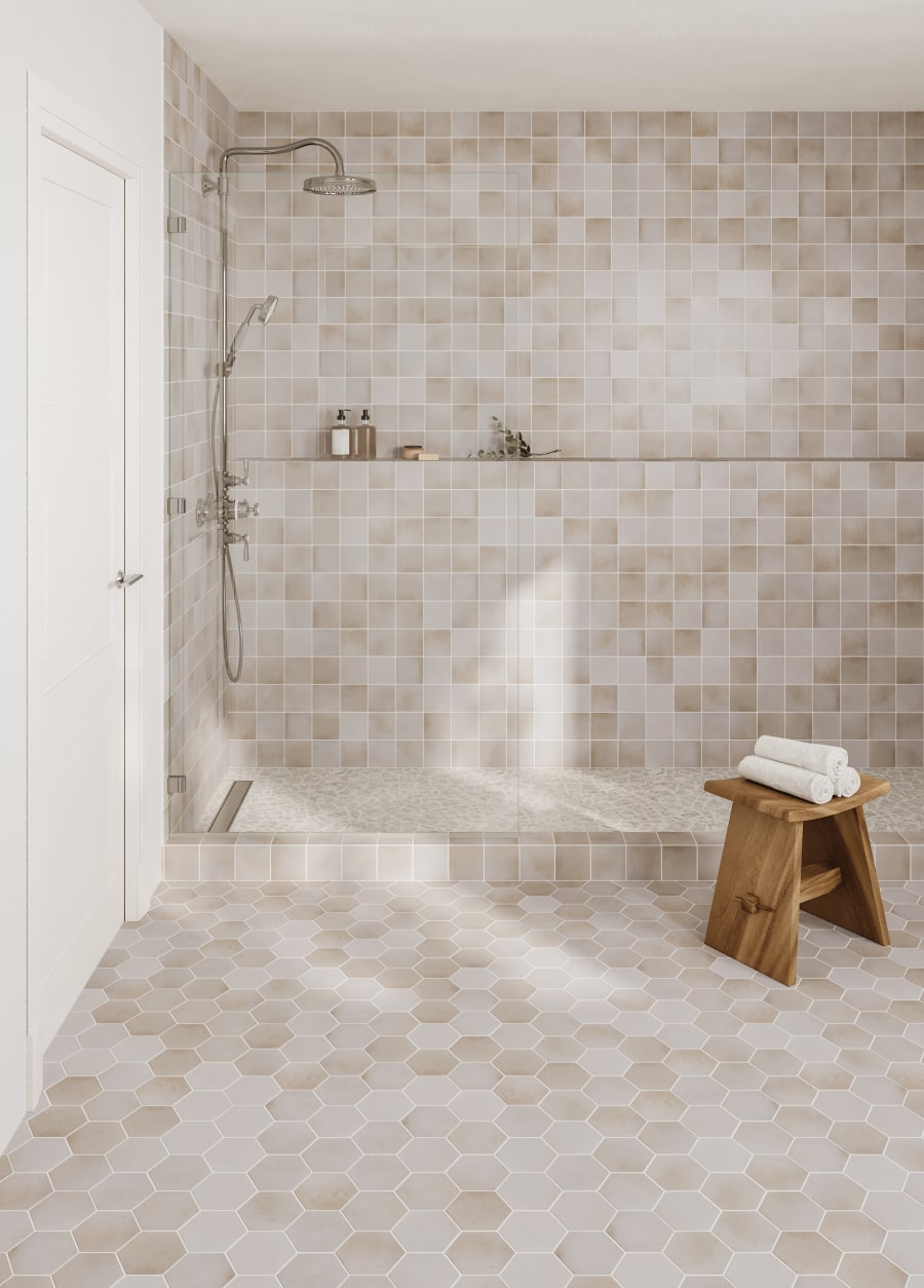 Small square shower wall and floor tile in modern bathroom design in beige and white