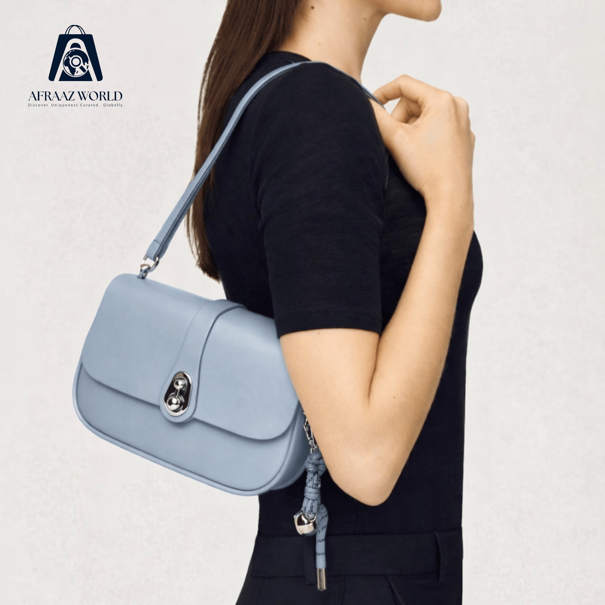 The Lumina Twist-Lock Crossbody Bag