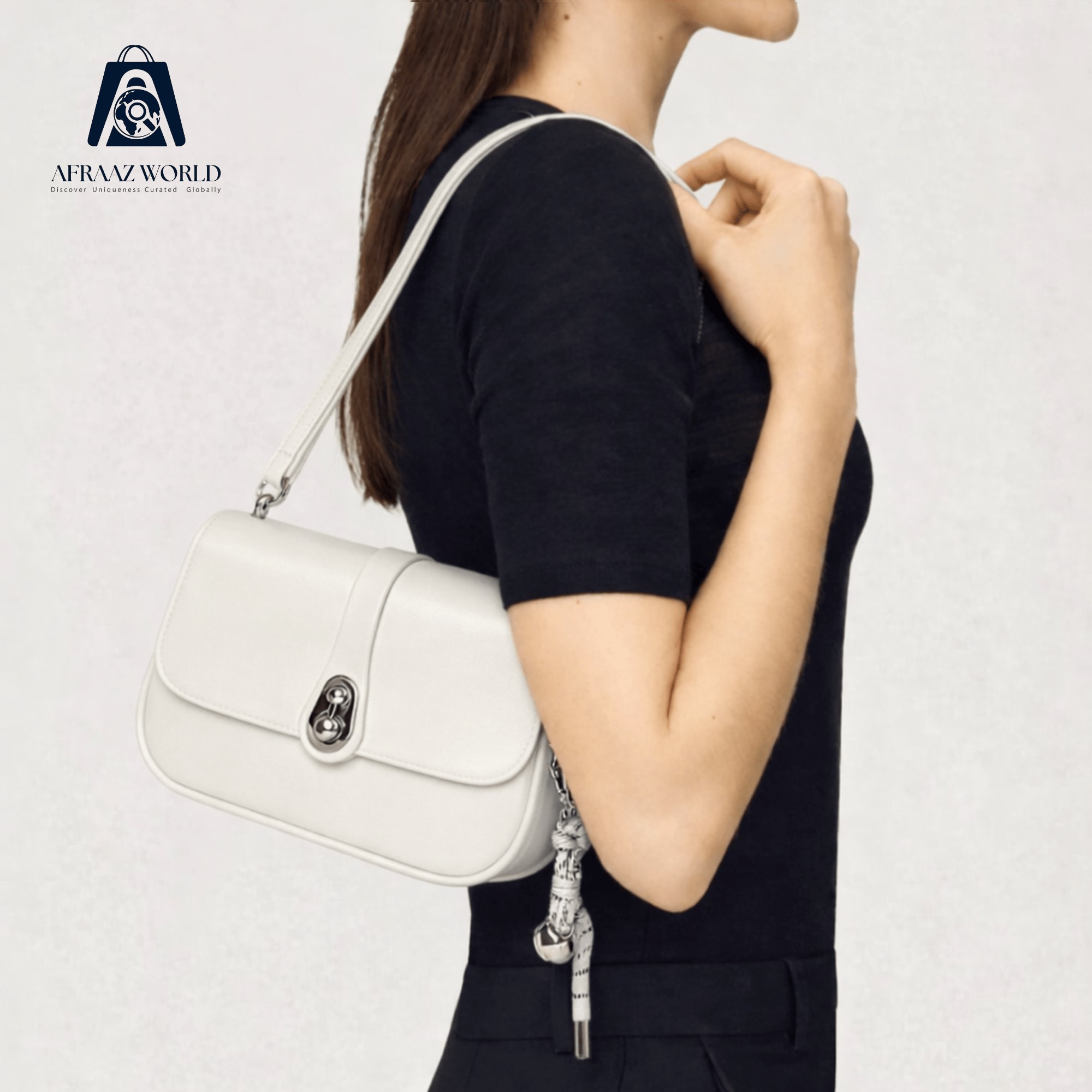 The Lumina Twist-Lock Crossbody Bag