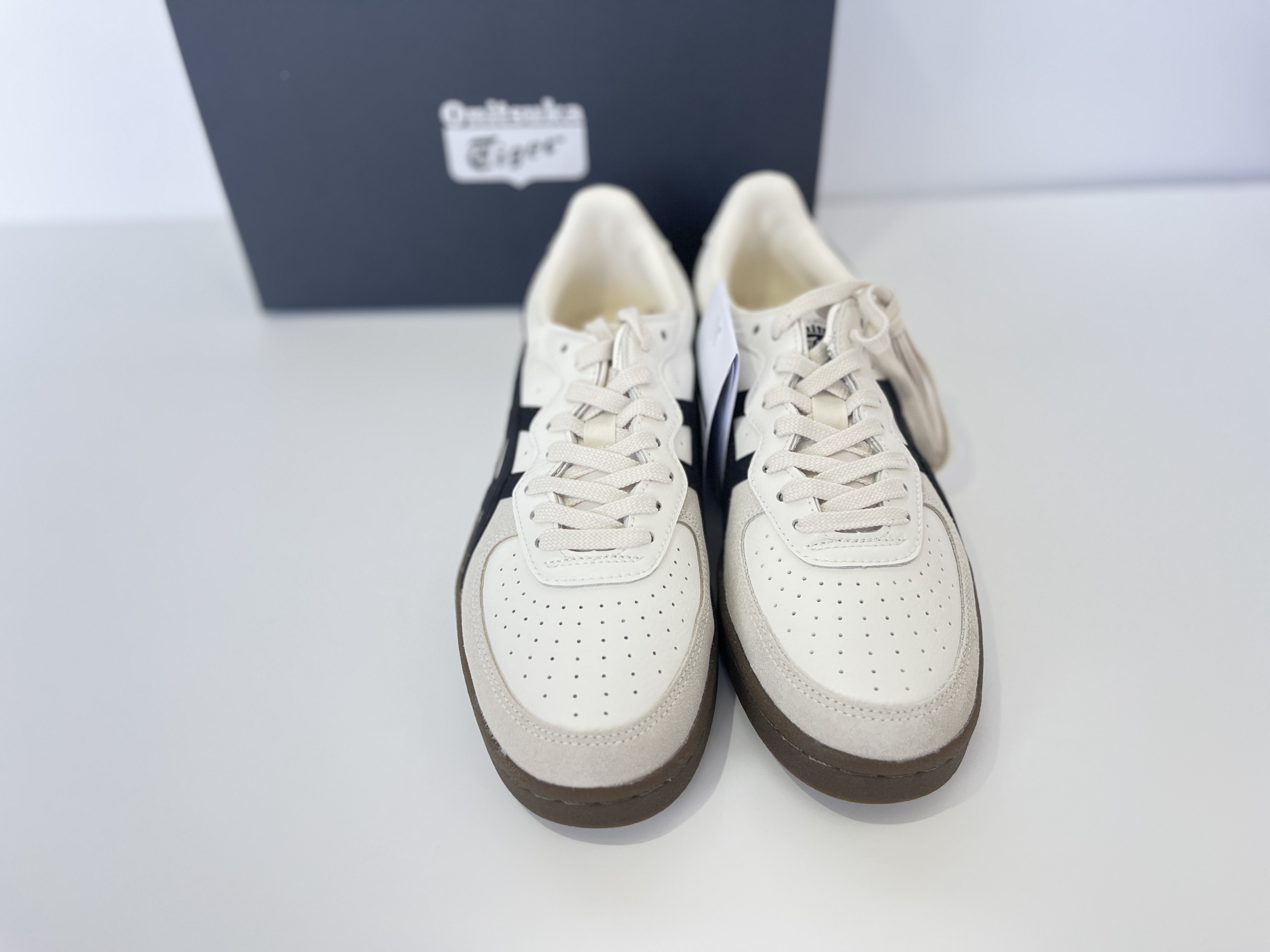 Onitsuka Tiger GSM Cream/Black rear view showing heel counter and stripe detail