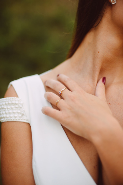 How to make your neck look younger. Women touching her neck