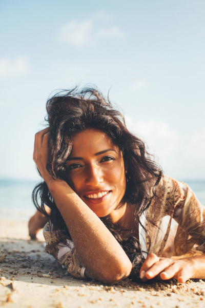 Best sunscreen moisturizers Woman smiling in sun