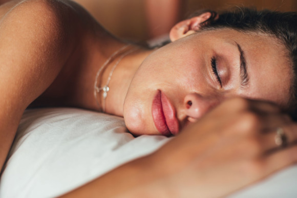 Woman sleeping on pillow