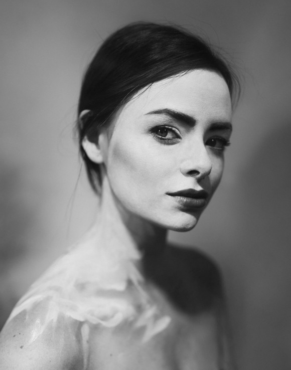 Woman with white face paint