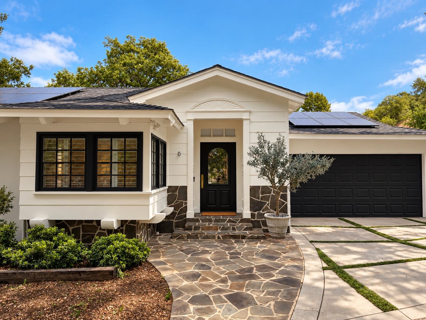 Front facade with solar panels and garage, 16822 Escalon Dr