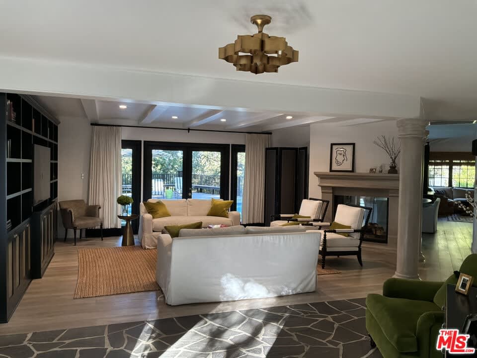 Open living room with fireplace, 16822 Escalon Dr