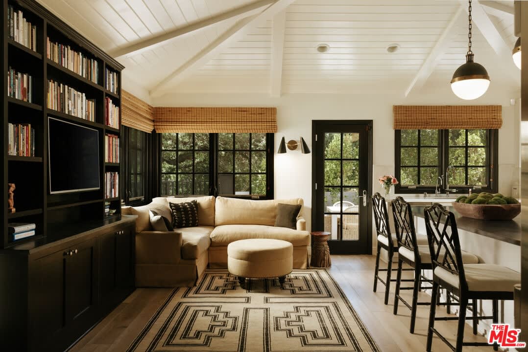 Family room with vaulted ceiling and built-ins, 16822 Escalon Dr