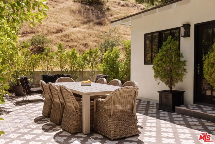 Patio dining table with wicker chairs, 16822 Escalon Dr