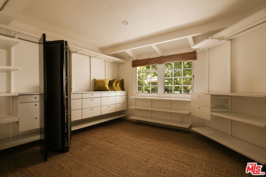 Walk-in closet with built-in shelving, 16822 Escalon Dr