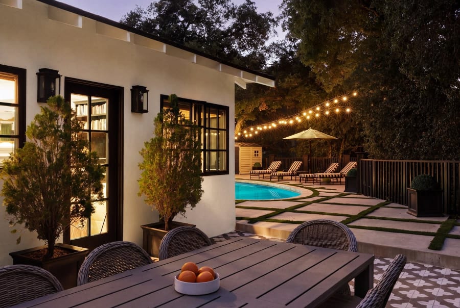 Dusk patio with string lights and pool, 16822 Escalon Dr
