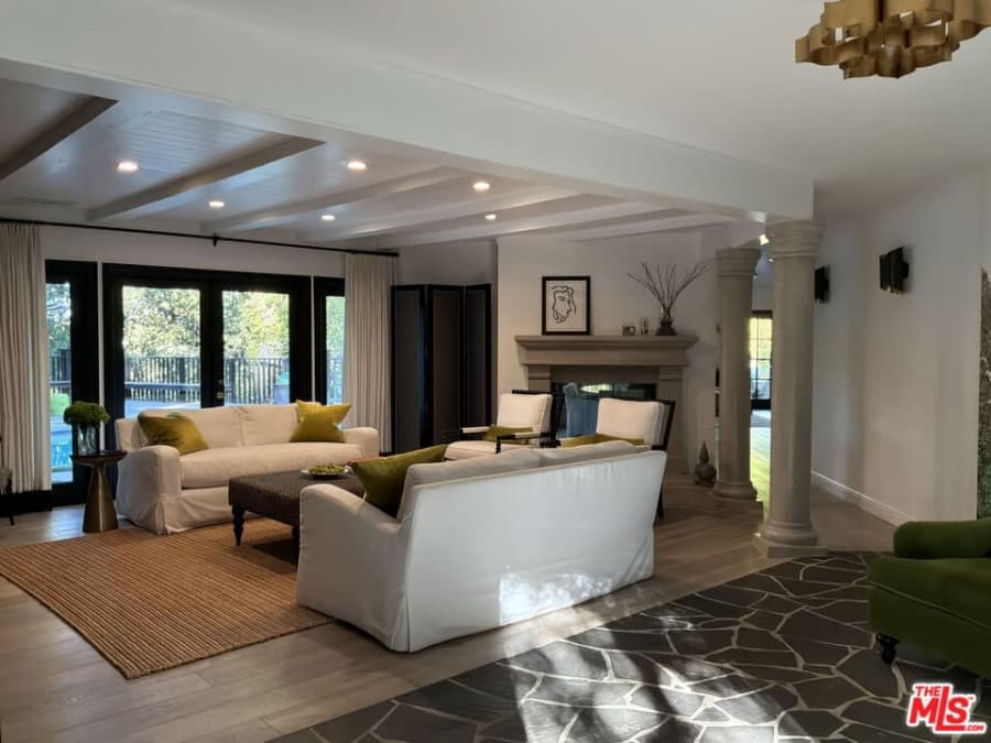 Living room with columns and beams, 16822 Escalon Dr