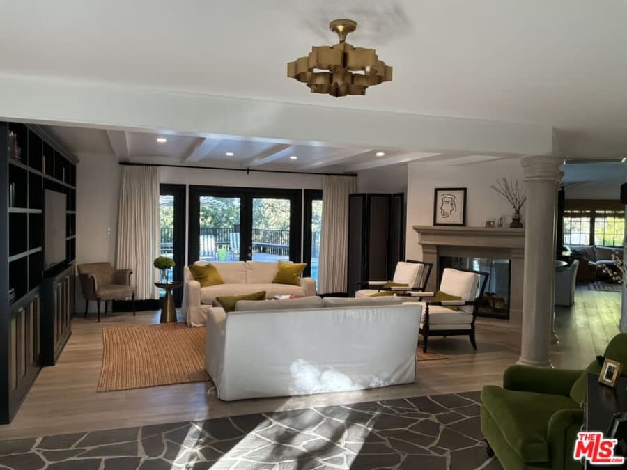 Open living room with fireplace, 16822 Escalon Dr