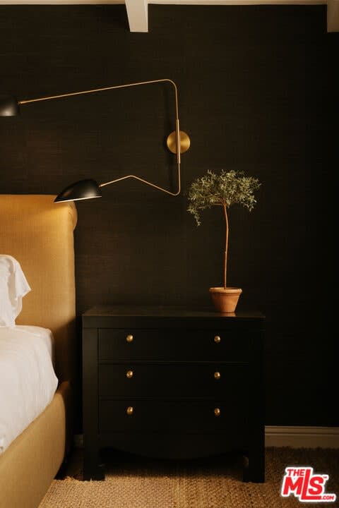 Bedside chest with brass sconce, 16822 Escalon Dr