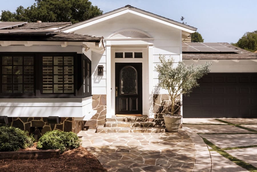 Front entry with flagstone path and olive tree, 16822 Escalon Dr