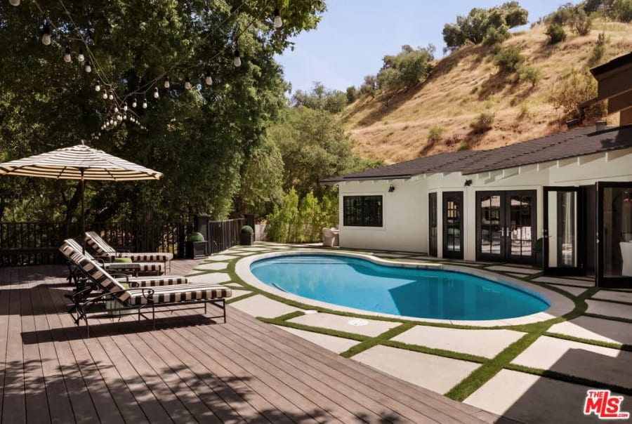 Pool and deck with hillside backdrop, 16822 Escalon Dr