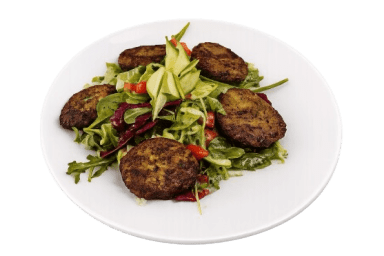 Polpette vegetariane con insalate fresche e salsa all'aglio