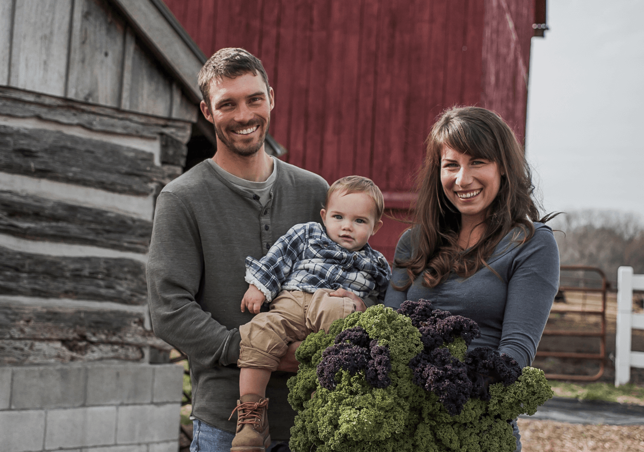 family holding kale